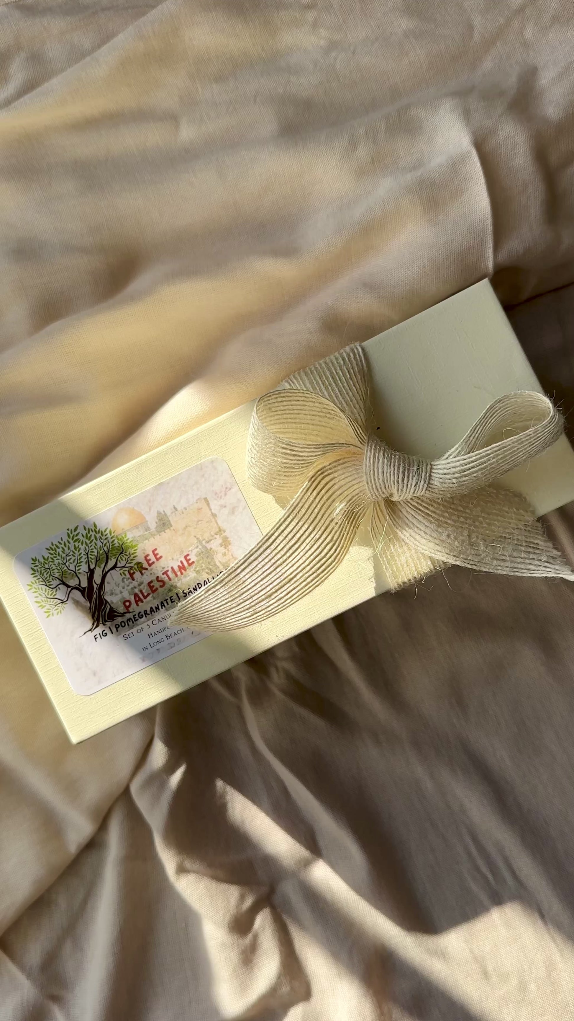 Support the Gaza humanitarian crisis with our 'Free Palestine' candle set from SoltreeCo. Each 2.5 oz candle, infused with fig, pomegranate, or oud oils, embodies Palestinian culture. Included is a card with candle information and a playlist reflecting Palestinian resilience. Each set also includes a solidarity-themed handmade bookmark featuring a poem by Refaat Alarar, a Palestinian activist. Stay tuned for updates.